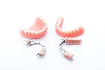 two full dentures and two partials