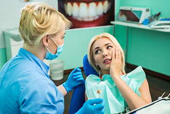 An emergency dentist in Temple treating a patient