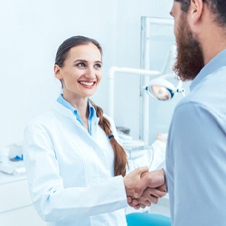 Man shaking hands with his dentist