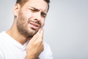 man with toothache